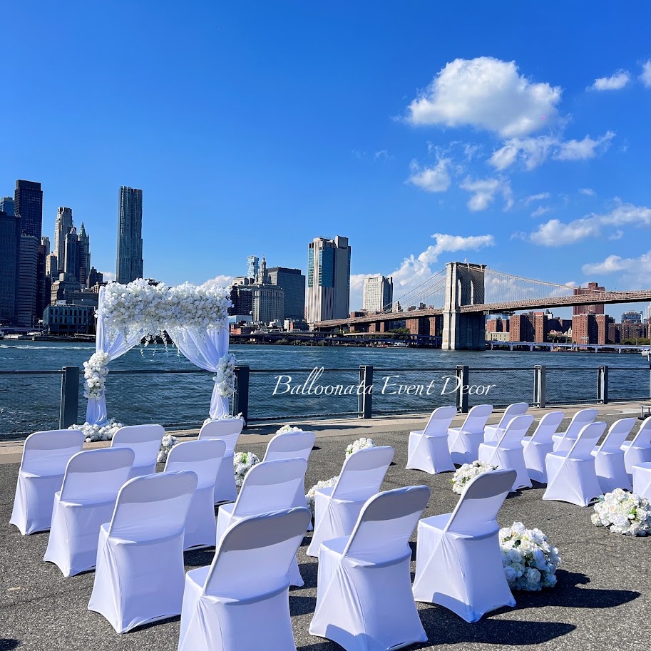Head table draping with warm ambient lighting and delicate floral touches.